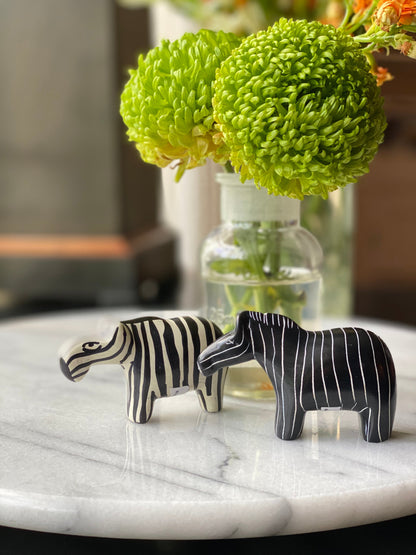 Decorative zebra set featuring contrasting carved designs