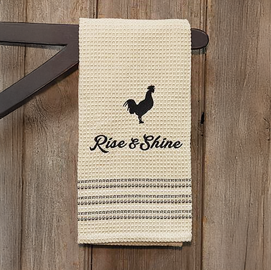 Tan cotton waffle weave dish towel with black rooster and “Rise & Shine” message, rustic farmhouse kitchen style