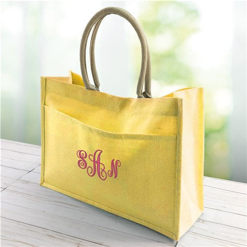 Yellow jute tote with bold block monogram embroidery and roomy interior