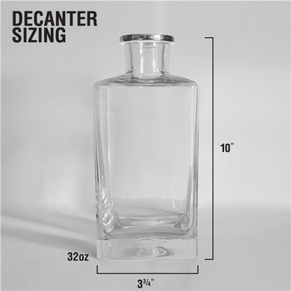 Square hand-blown glass decanter with dome topper displayed on bar cart