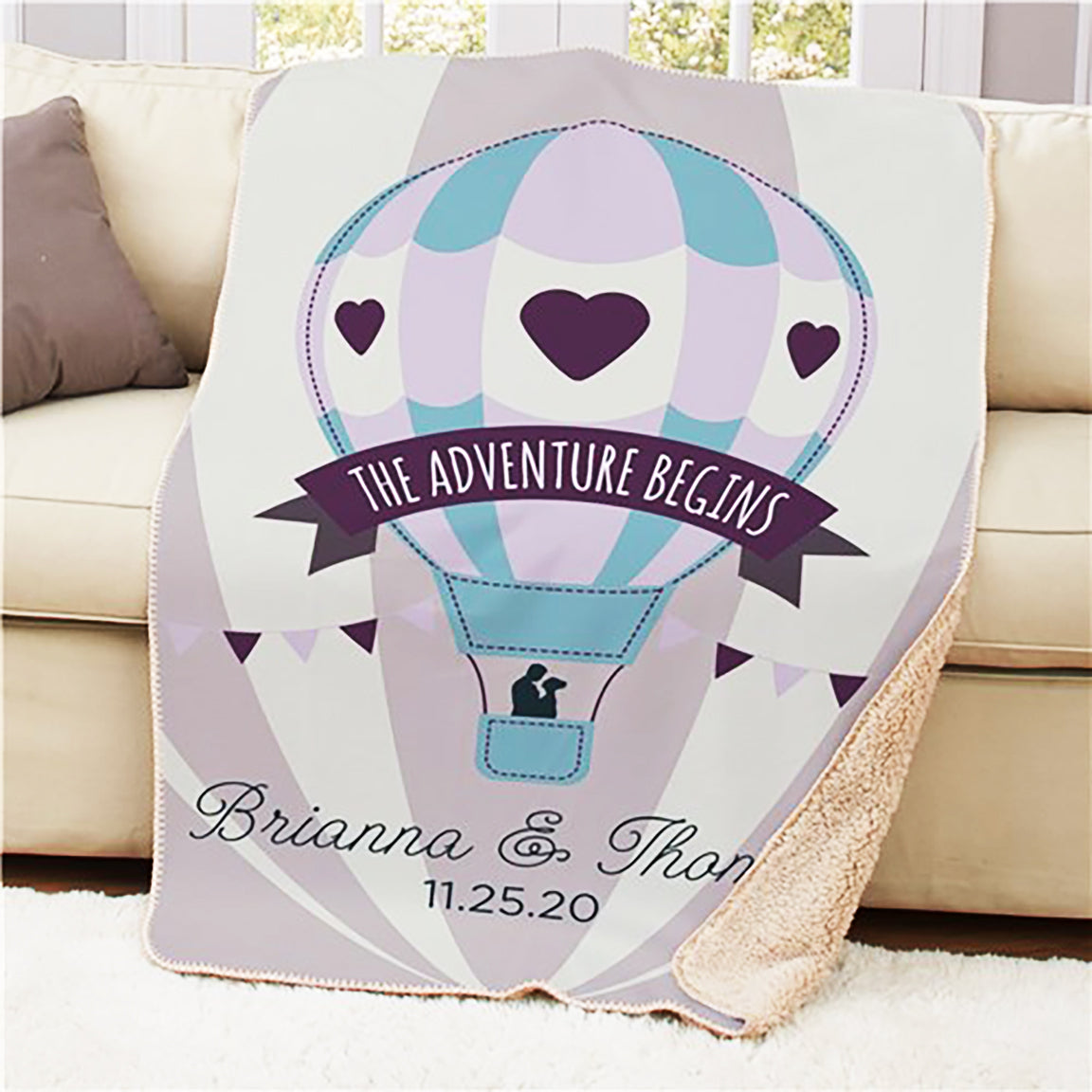 Personalized sherpa blanket with 'The Adventure Begins' design and custom names and date