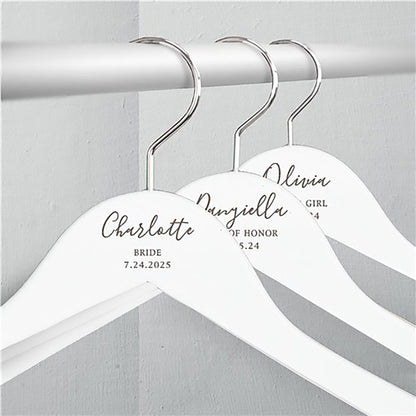 Engraved wood hanger for wedding day attire with personalized name, title, and date, ideal for bridal party gifts